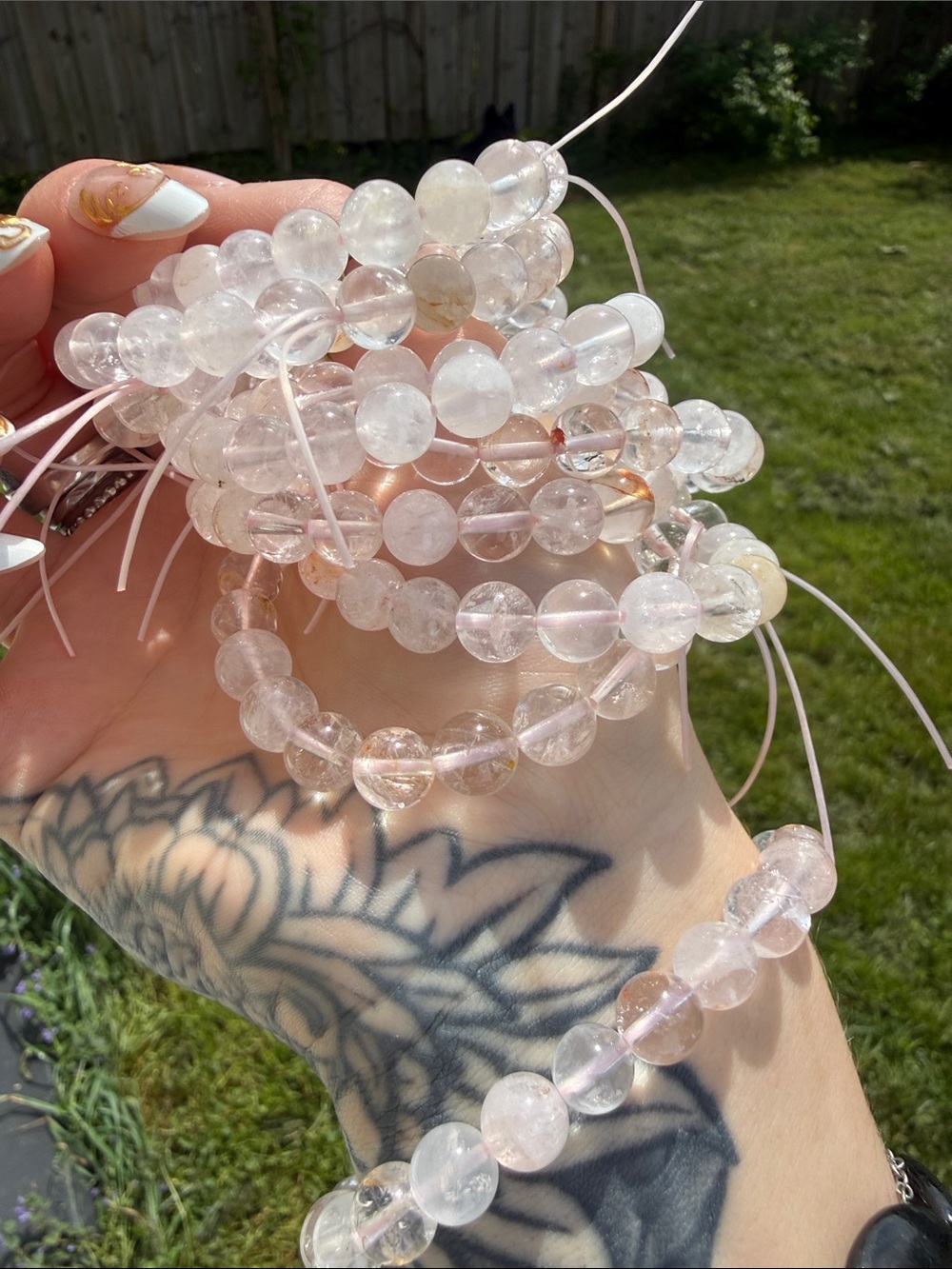 (1) Pink Feather Phantom Clear Quartz w/ iron inclusions Stretch Bracelet